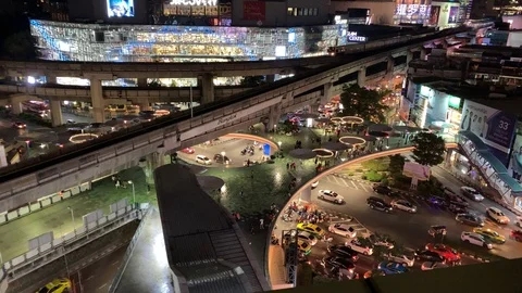 Timelapse of urbane, dynamic transport web at night downtown Stock Footage 117767702