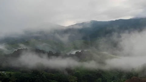 Timelapse of valley surrounded by mountains and covered with dense ground fog  Stock-Footage 146023049