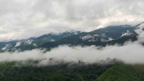 Timelapse of valley surrounded by mountains and covered with dense ground fog  Stock-Footage 146023266