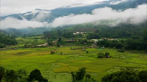 Timelapse of valley surrounded by mountains and covered with dense ground fog  Stock-Footage 146023364