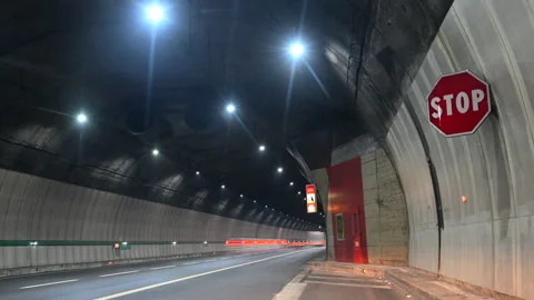 Timelapse of vehicles  driving through tunnel Stock Footage 168808045