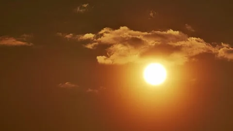 Timelapse of vibrant red sunset over dark mountain forest for social media Видео 336395162