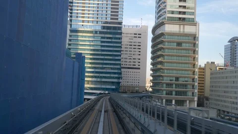 Timelapse video of automatic train traveling on rail of Yurikamome Line in Tokyo Stock Footage 112478598