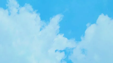 Timelapse video of blue sky with moving white clouds Stock Footage 330566464