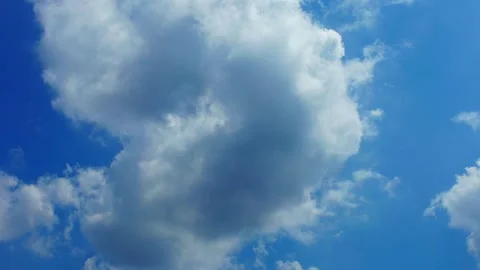Timelapse video of blue sky with moving white clouds Stock Footage 330811727