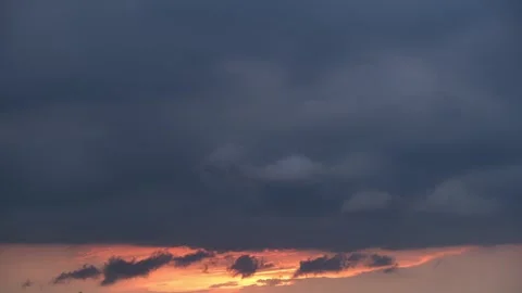 A timelapse video captures a dramatic sunset. Stock Footage 314096073