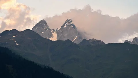A Timelapse Video of clouds movement around Mount Ushba Stock Footage 248642028