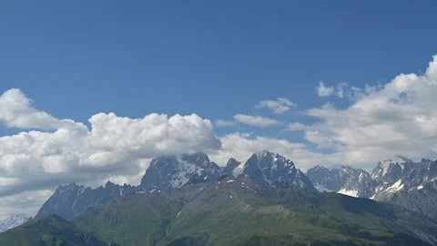 A Timelapse Video of clouds movement around Mount Ushba Stock Footage 248642488