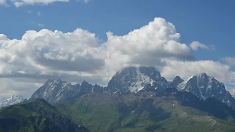 A Timelapse Video of clouds movement around Mount Ushba Stock Footage 248642854