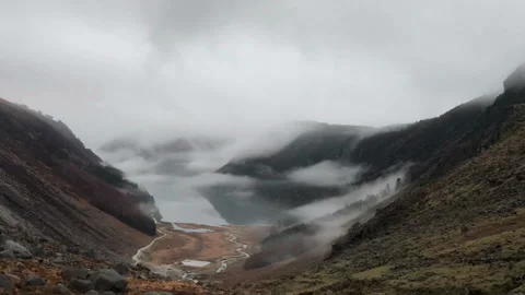 Timelapse video of clouds moving above the Glendalough lake in Ireland Stock Footage 88105681