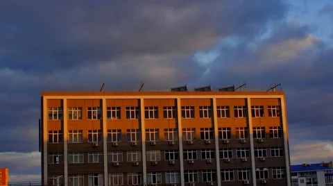 Timelapse video of clouds passing over the office building Stock Footage 43295347
