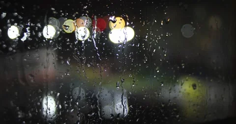 Timelapse video of drops of night rain on the window Stock Footage 139112449