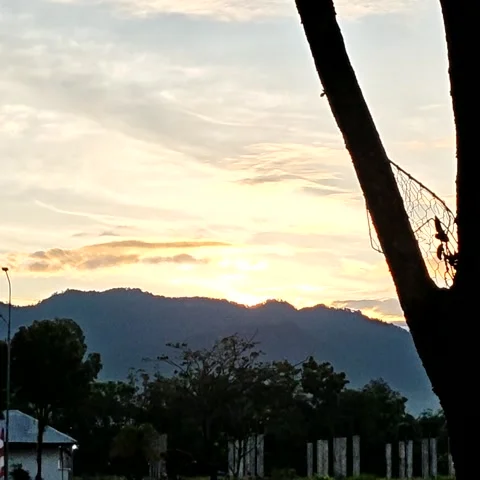 Timelapse video footage of the sun rising from behind the hill Video stock 343586653