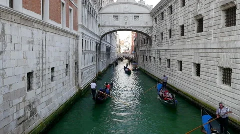 Timelapse video of gondolas are rowing along the beautiful Venice canal Stock Footage 64736109