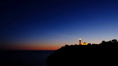 Timelapse video of Lighthouse at starry night, Portugal. Video stock 108096597