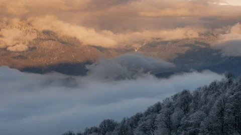 Timelapse video low cloud covers winter mountains Stock Footage 103531859