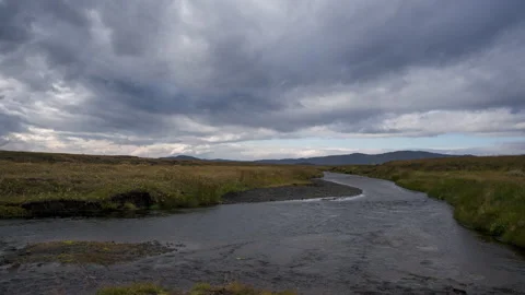 Timelapse video of the movement of the clouds next to a river Stock Footage 170299259