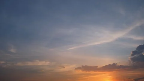 A timelapse video shows a vivid sunset. Stock Footage 314096116