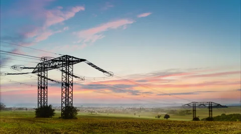 Timelapse video of sunrise over empty field with electrical wires Stock Footage 35879398