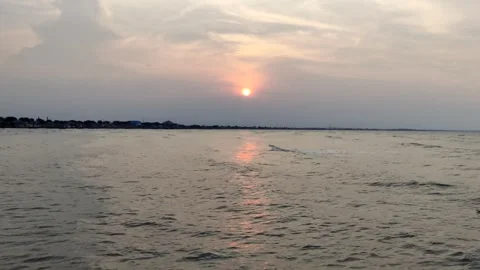 Timelapse video of sunset at Boom Beach in Tuban, East Java, Indonesia Stock Footage 276455331