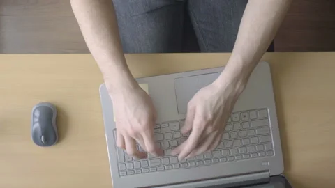 Timelapse video of top view man working on his laptop Stock-Footage 87388018