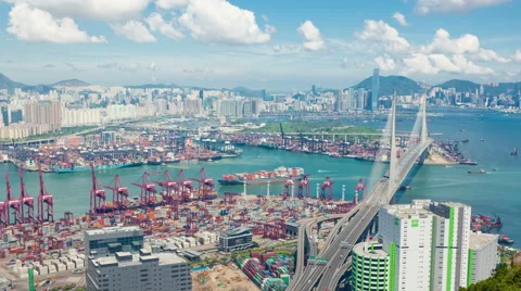 Timelapse video tracking a container ship arriving at a dock Video stock 54084261