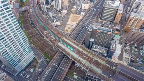 Timelapse video of traffic and high speed train at Sendai in Japan Stock Footage 258416083