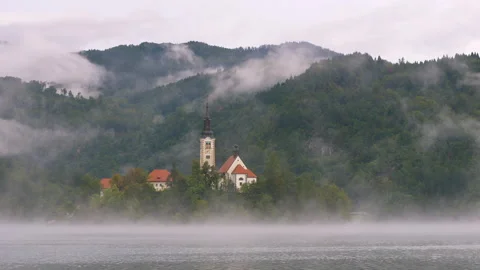 Timelapse video with view of lake Bled and Bled island with Pilgrimage Church of Stock Footage 150745057
