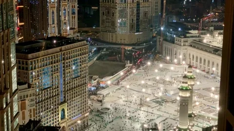 Timelapse view from above showing Umrah pilgrims walking across Stock Footage 332588077