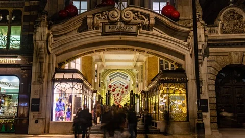 Timelapse view of an arcade with Christmas decorations in London Stock Footage 101909398