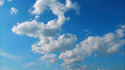 Timelapse view of blue sky with clouds. Blue background Stock Footage 122612892
