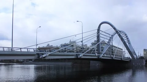 Timelapse view to the bridge in the city on a clear sunny day Stock Footage 130177492