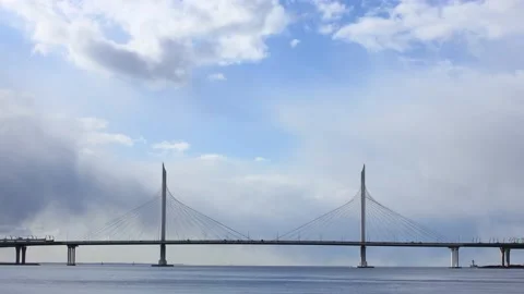 Timelapse view to the bridge in the sea on a clear sunny day Stock Footage 130178017