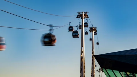 Timelapse view of cable cars over the river Thames in the Docklands in London Stock Footage 92306182