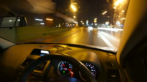 Timelapse view of a car speeding through a UK town at night 스톡 동영상 144186208