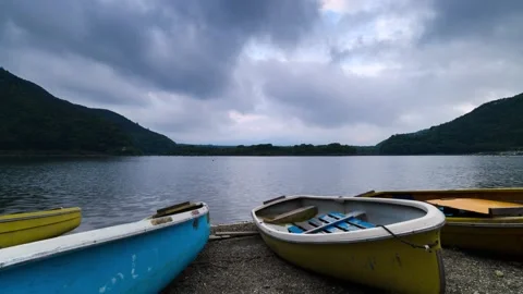 Timelapse view of cloudy sky at sunset from lake Shoji, Yamanashi Prefecture Stock Footage 155664862