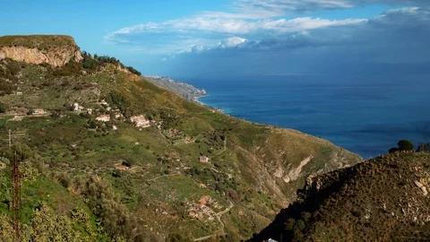 TImelapse view of the East coast of Sicily from Taormina Stock Footage 122937381