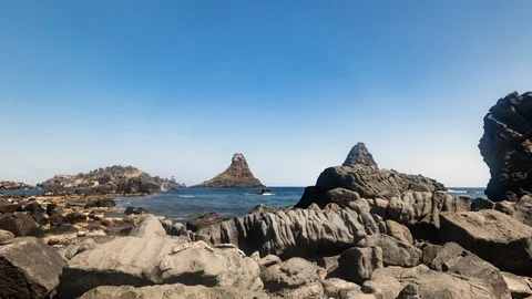 Timelapse view of the Faraglioni, small volcanic island in Sicily Stock Footage 105682378