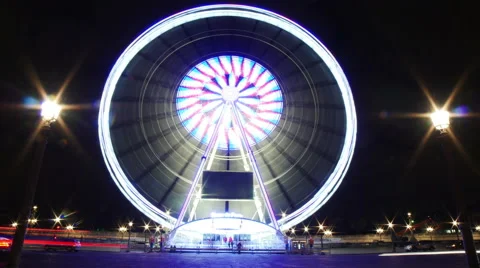 A Timelapse View on Ferris Wheel in Paris France by Night Stock Footage 57920221