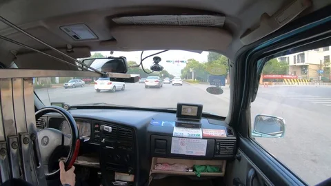  Timelapse view from inside taxi car view to outside at Kunming City, China Stock Footage 104883931