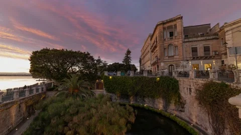 Timelapse view of the island of Ortigia (Syracuse) in Sicily at sunset Stock Footage 134547835