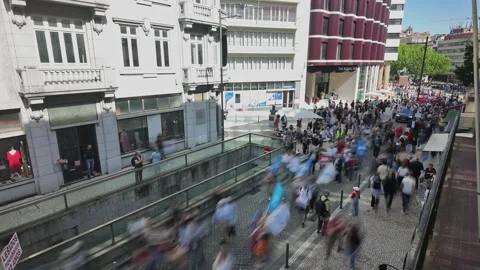 Timelapse view of a large crowd of people walking through a busy urban street, Stock Footage 335026196