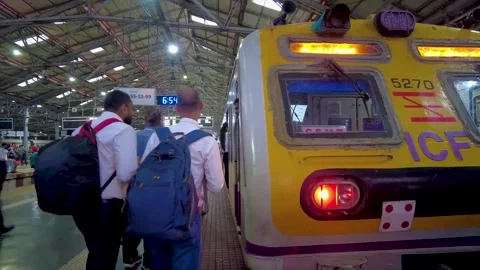 Timelapse view of local trains arriving at Dadar Railway Station. 4K Stock Footage 252709428