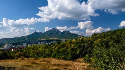 Timelapse with a view of the mountains and clouds moving across the sky Stock Footage 274991544