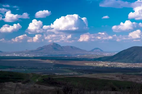 Timelapse with a view of the mountains and clouds moving across the sky Stock Footage 274993128