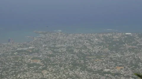 Timelapse view overlooking oceanside city Stockbeeldmateriaal 62261905