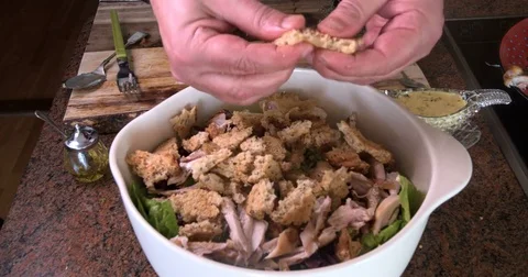 Timelapse view of the preparation of a delicious Caesar's salad Stock Footage 74574964