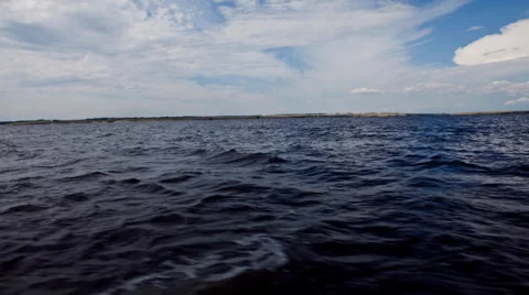 Timelapse view of  river and the shore from a ship going down  river Stock Footage 30823071