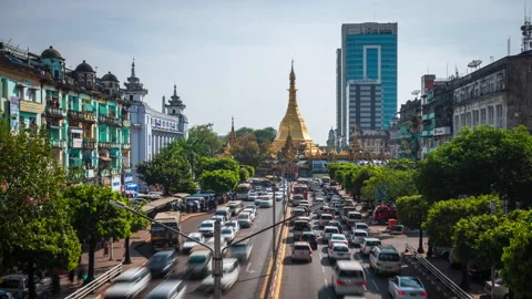 Timelapse View of Rush Hour Traffic Near Sule Pagoda in Downtown Yangon, Myanmar Stock Footage 147736510
