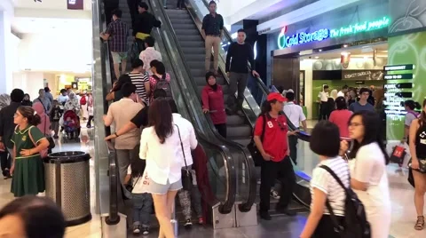 Timelapse view of shoppers in Suria KLCC Mall interior Stock Footage 68410929